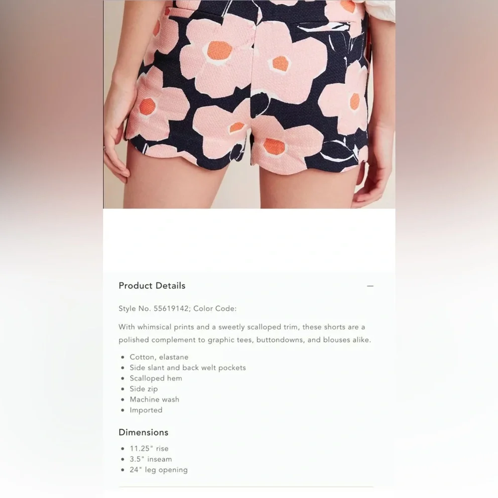Anthropologie Navy, Pink and Coral Floral Scallop-Hem Shorts with side zipper.